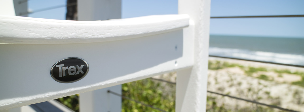 Trex medallion on white dining chair in beach side setting